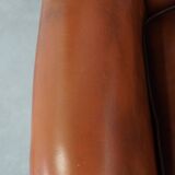 Very beautiful, stately, cowhide Chesterfield wing chair with elegant legs in a nice brown color