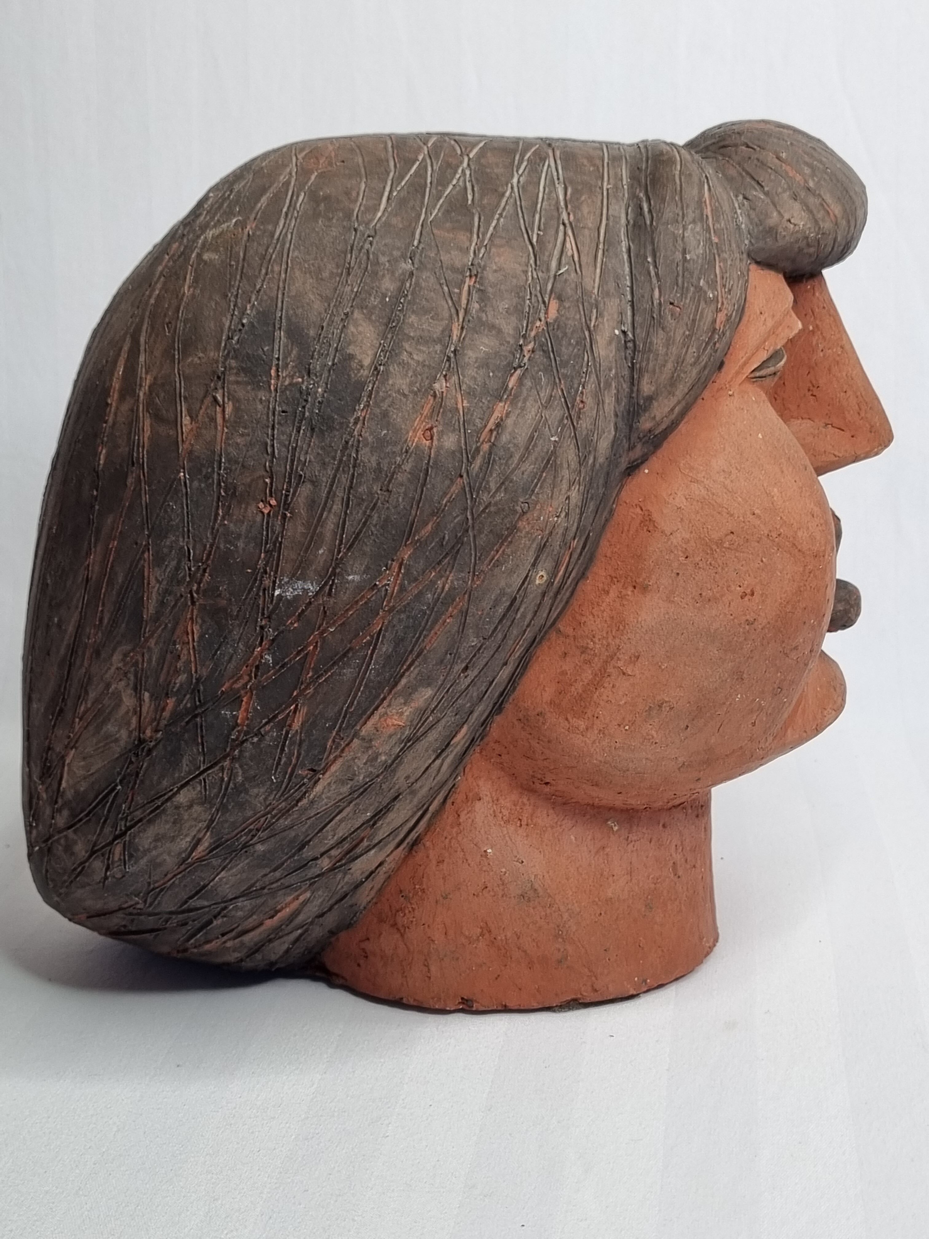 Set of 3 decorative women's heads in red terracotta