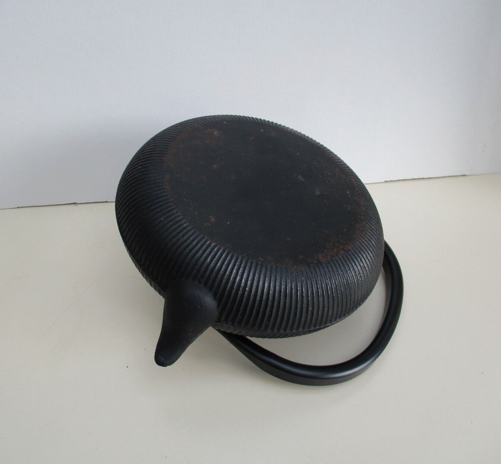 Asian teapot in black cast iron