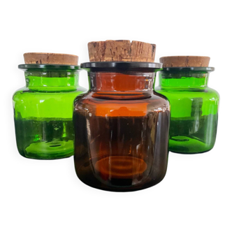 Trio of amber and green glass apothecary jars