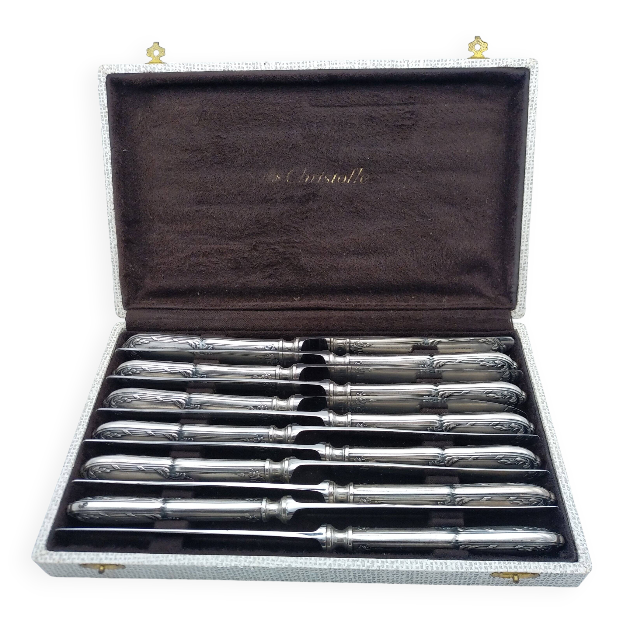 Set of 12 sfam knives in silver metal and stainless steel blades.