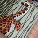 Vintage wool rug featuring a leopard (tiger)