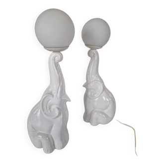 A pair of art deco revival ceramic elephant lamps