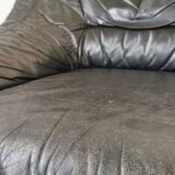 Pair of black leather armchairs from the 80s