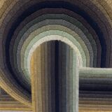 Kinetic tapestry with geometric pattern by Patrice Allard.