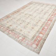 Tapis persan vintage à motif floral