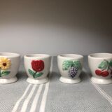 Ceramic shells with relief decoration of flowers (yellow and red) and fruits (cherries and grapes)