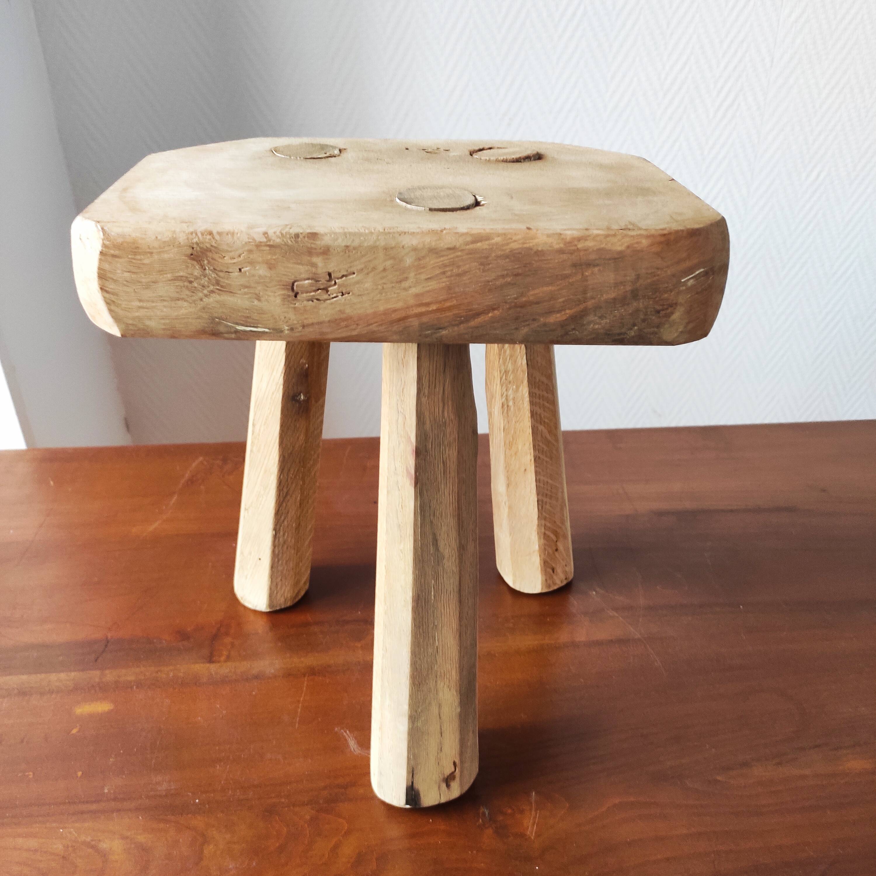 Vintage Danish brutalist tripod stool made of solid oak.