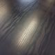 Vintage dining table in melamine with a black wood effect and chrome metal.
