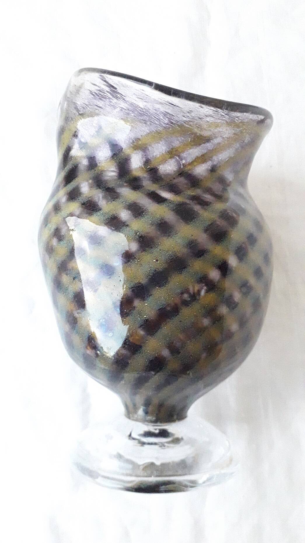 Glass vase on a stand