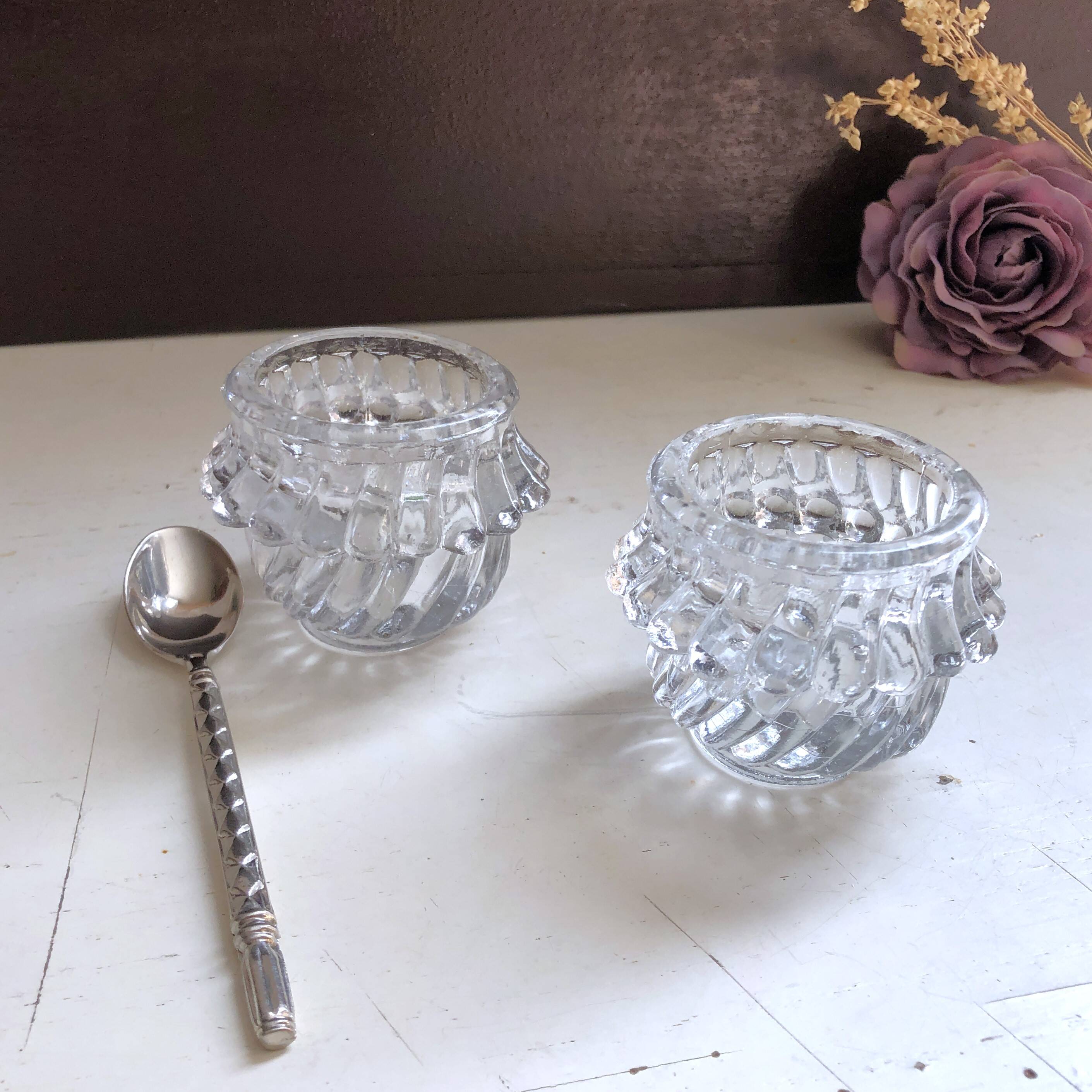 Glass salt and pepper shaker set with vintage serving spoon