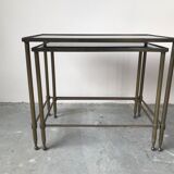 Pull-out tables in glass and brass