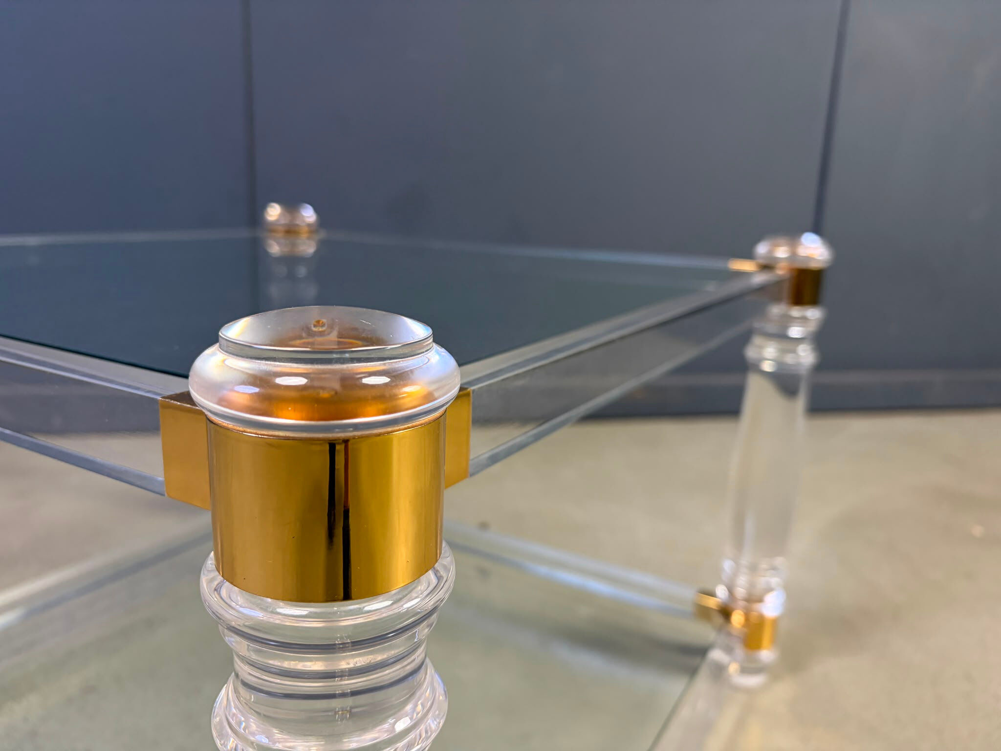Lucite and brass coffee table, 1970s