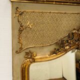 Miroir de style Louis XV en bois et stuc doré XX siècle