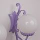 Wrought iron wall lights and glass spheres x2