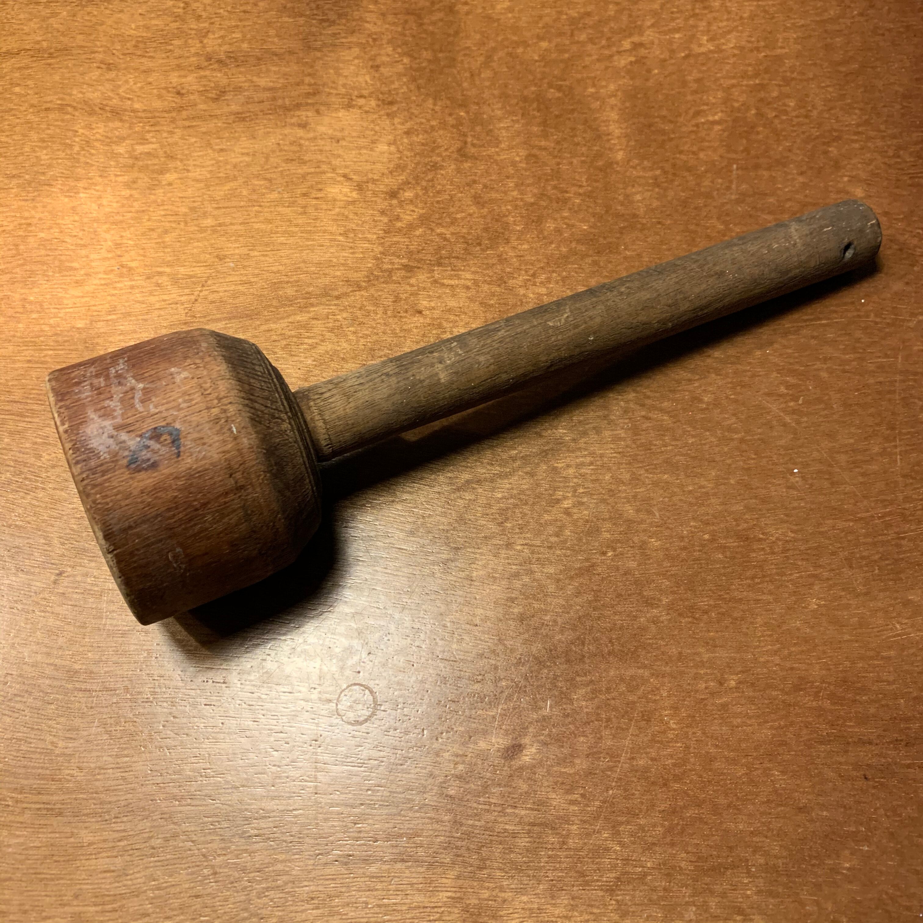 Old wooden pestle