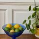 Bluish glass fruit bowl
