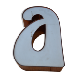 Teaches letter "a" in plexiglass