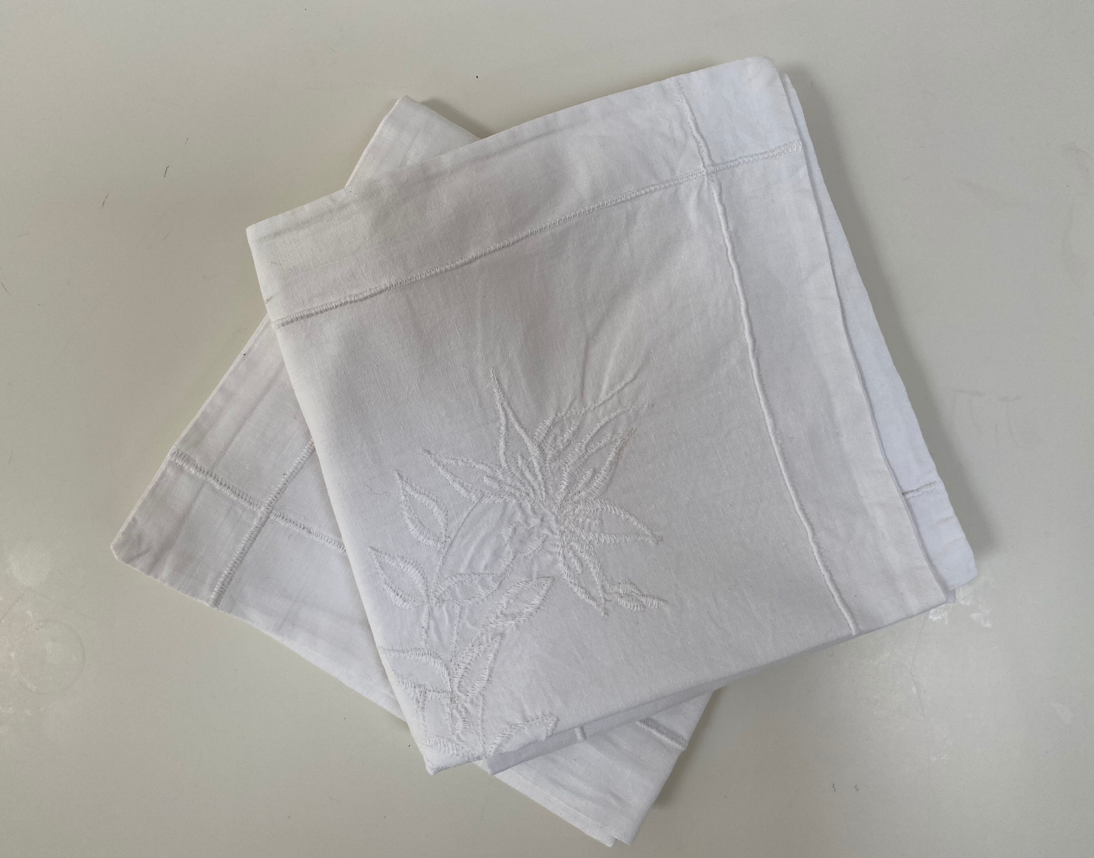 Set of 2 embroidered cotton covers for cushions / pillows