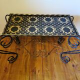 Table basse vintage fer forgé et céramique noire et dorée