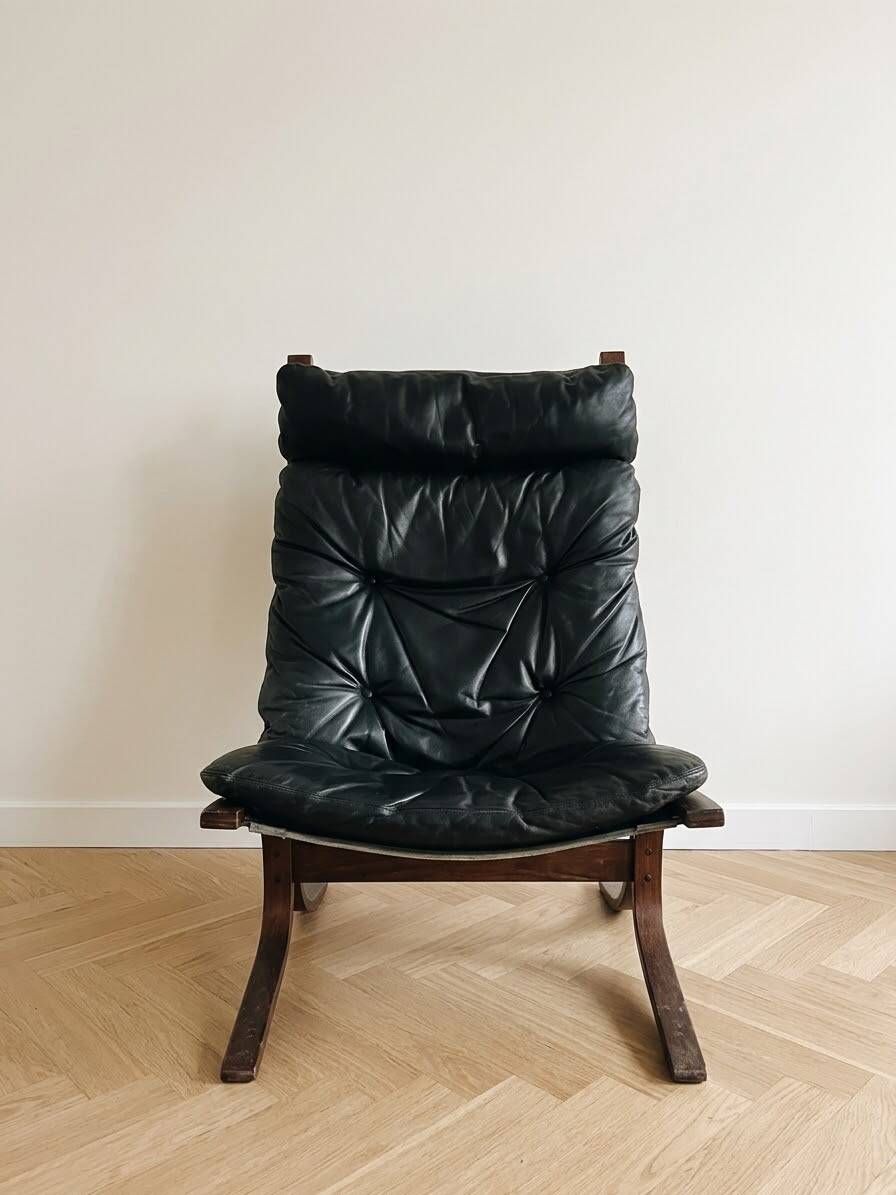 Vintage Siesta armchair by Ingmar Relling for Westnofa in black leather.
