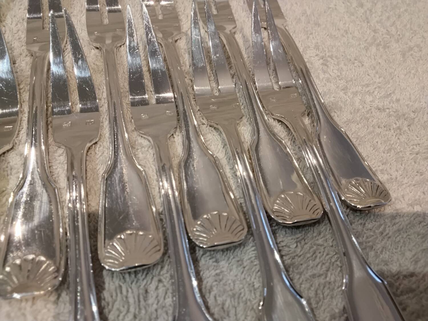 12 silver-plated metal snail forks by silversmith Noel Collet, shell design