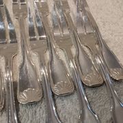12 silver-plated metal snail forks by silversmith Noel Collet, shell design