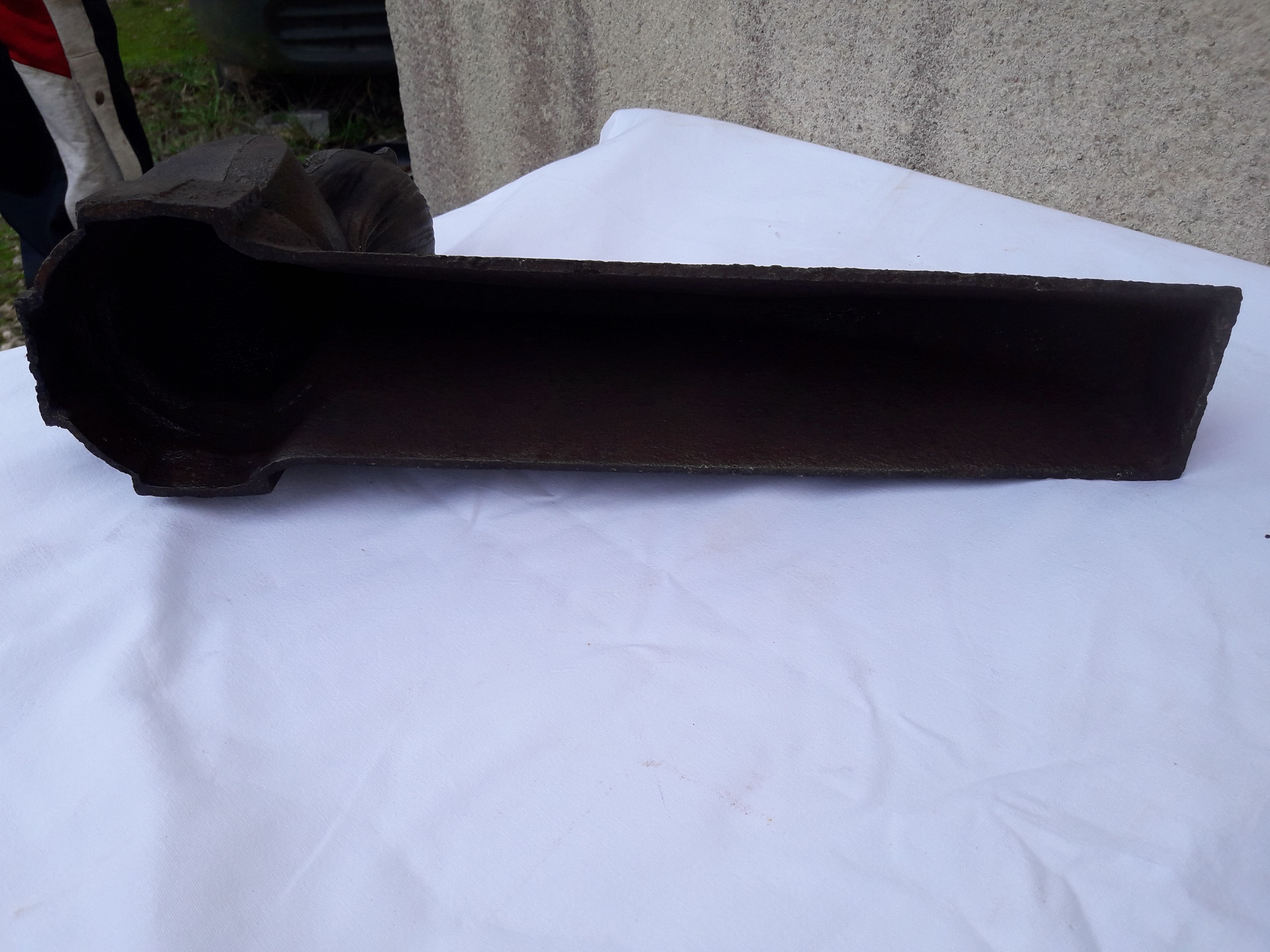 Pair of cast iron channels and metal FAU woman's head