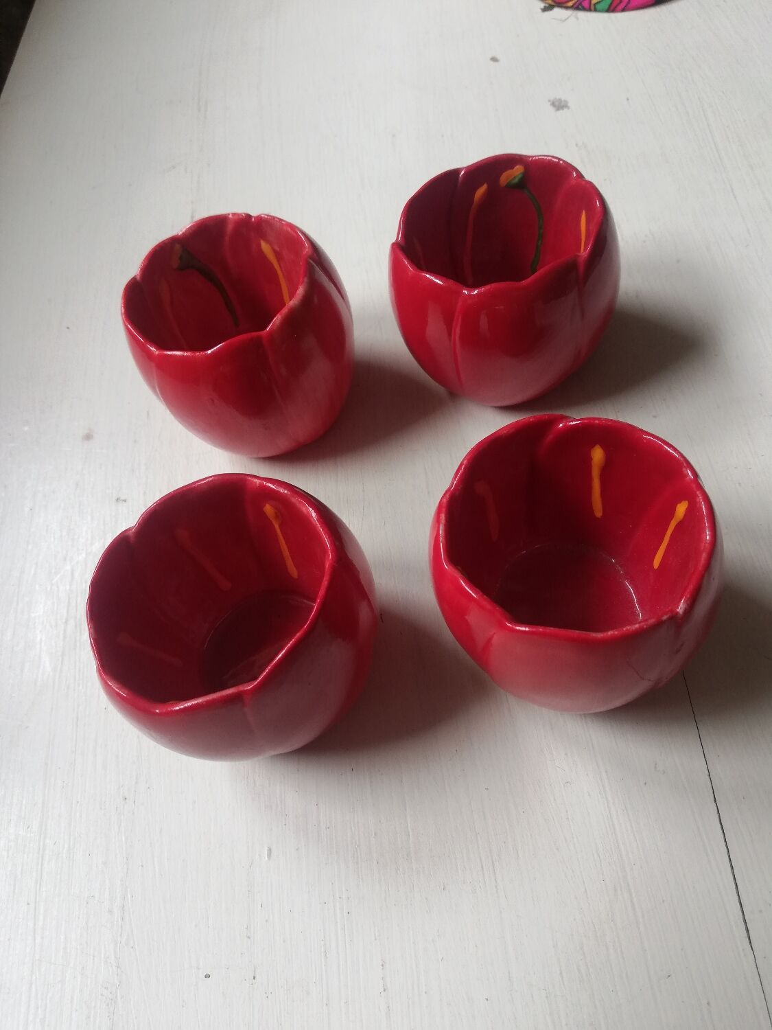 Set of 4 red tulip bowls by Villeroy & Boch.