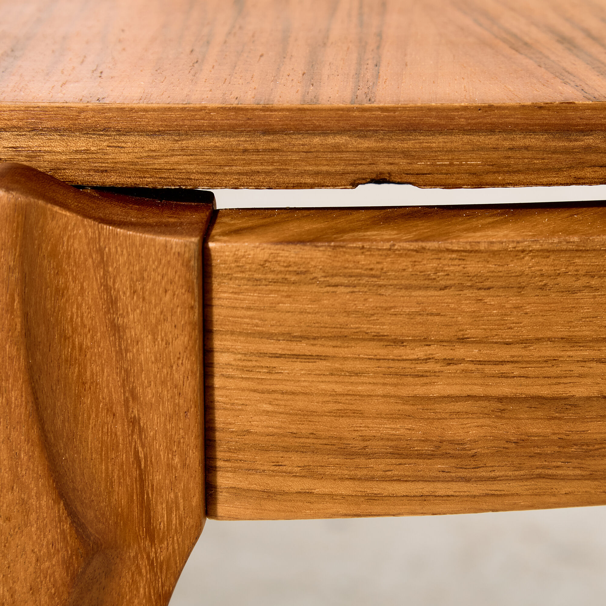Coffee table in walnut with a ceramic top.