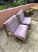 Pair of long armchairs in solid wood and leather, European work, circa 1970.