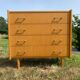 Commode 4 tiroirs vintage en aggloméré plaqué véritable bois