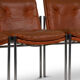 Series of twelve chairs in leather and chromed metal, 1970s