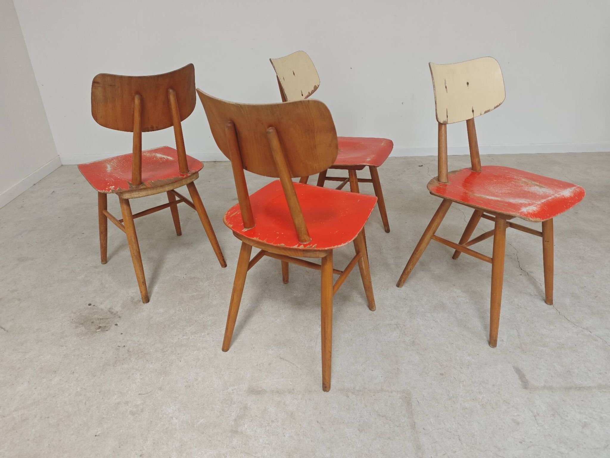 Set of 4 Ton (Thonet) red wooden chairs from the 1960s.
