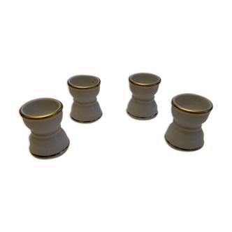 Lot de 4 coquetiers anciens en porcelaine blanche