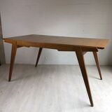 Dining table by Gérard Guermonprez by Magnani (1957)
