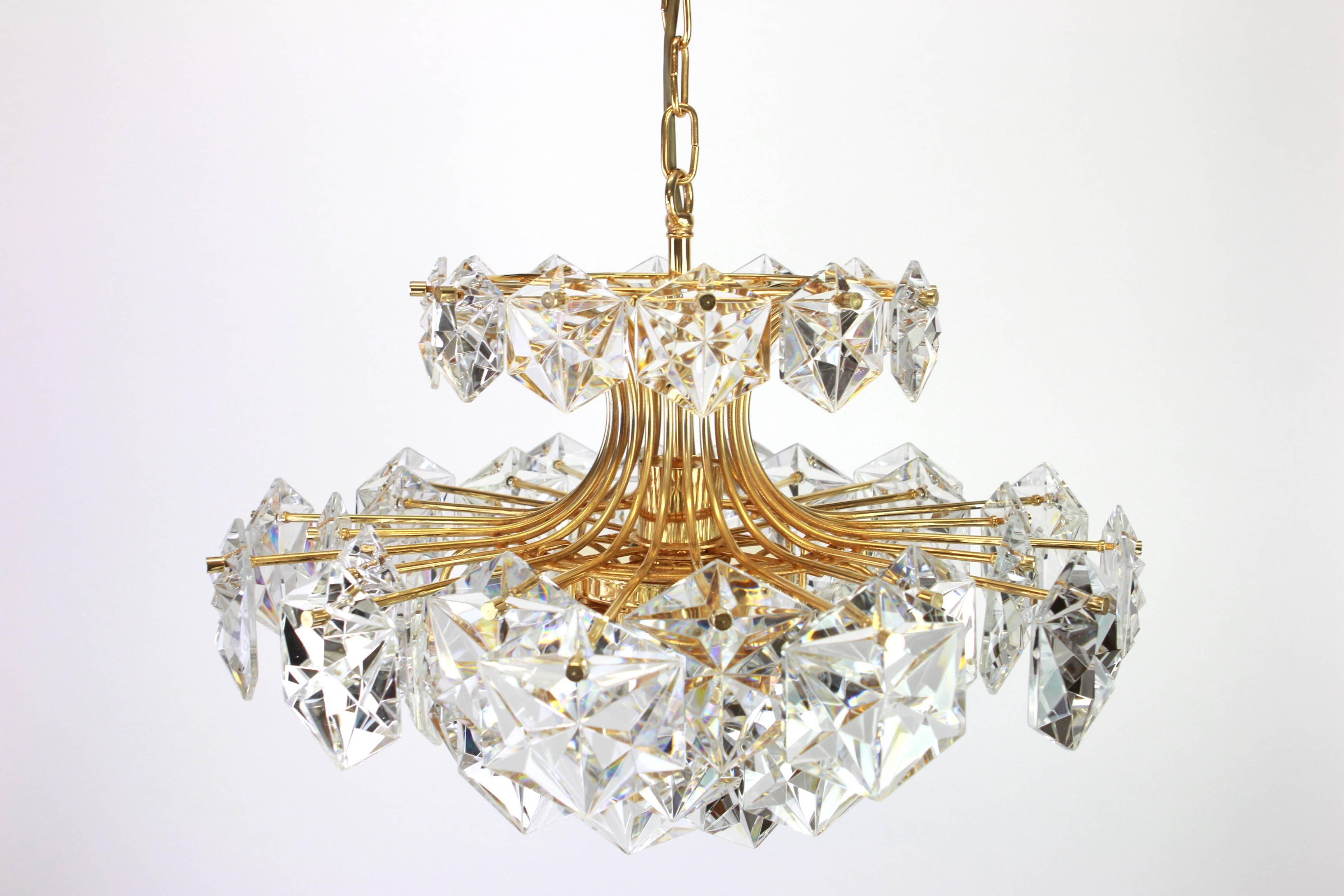 Chandelier in gilded brass and crystal glass by Kinkeldey, Germany, 1970s.