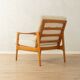 Elegant mid-century armchair from the 1960s with cream-white upholstery