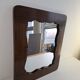 Czechoslovakian wall mirror with a wavy wooden frame, mid-century, 1940s