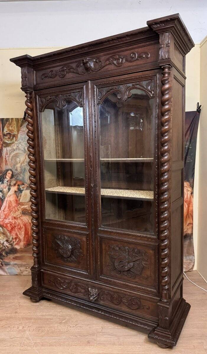 Renaissance style hunting lodge library in carved oak circa