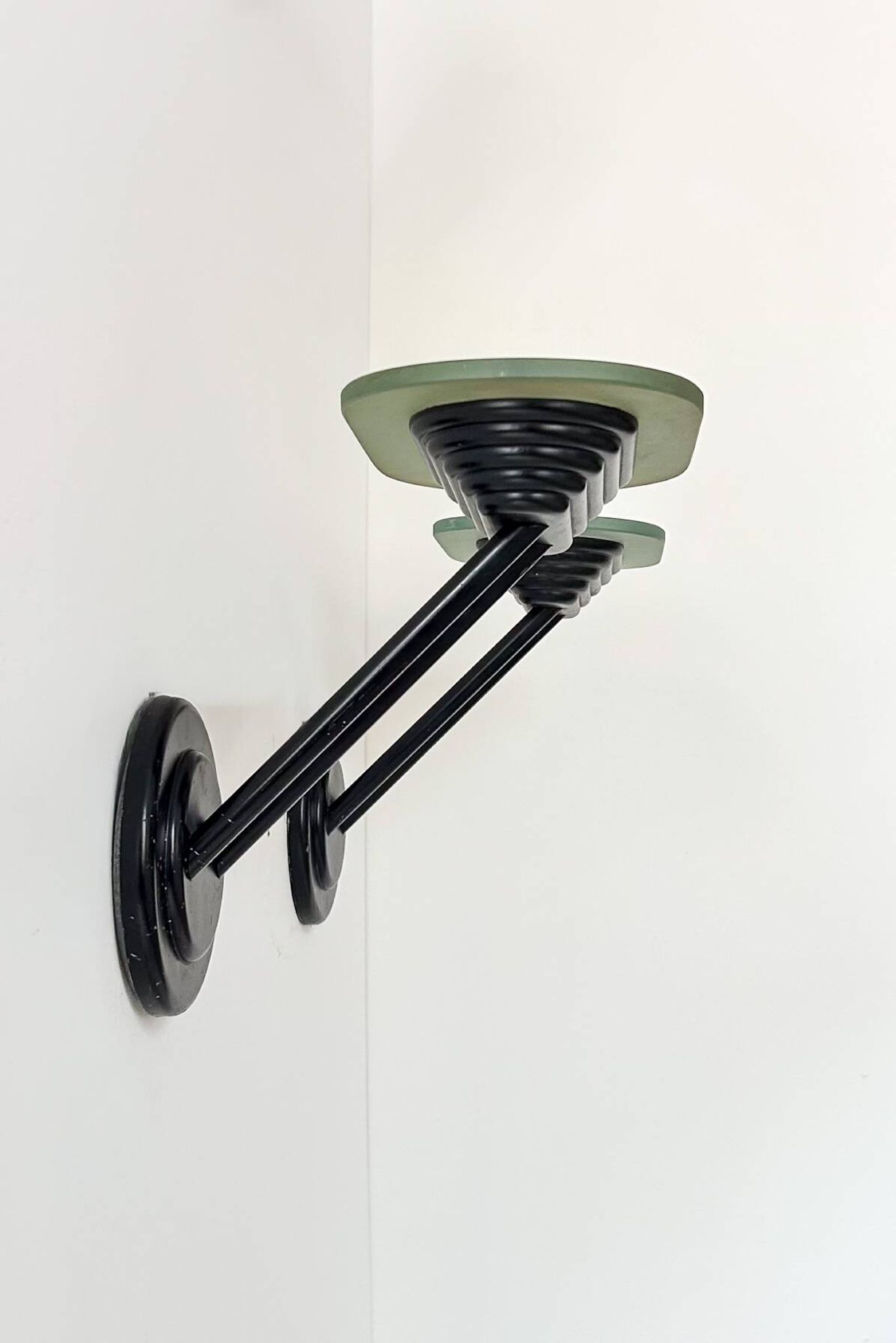 Pair of vintage wall lights in black metal and frosted glass, Italy 1980.