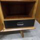 French wardrobe with tapered legs, 3 doors, 1 mirror (27*130), and 1 drawer.