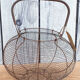 Old basket has wire eggs
