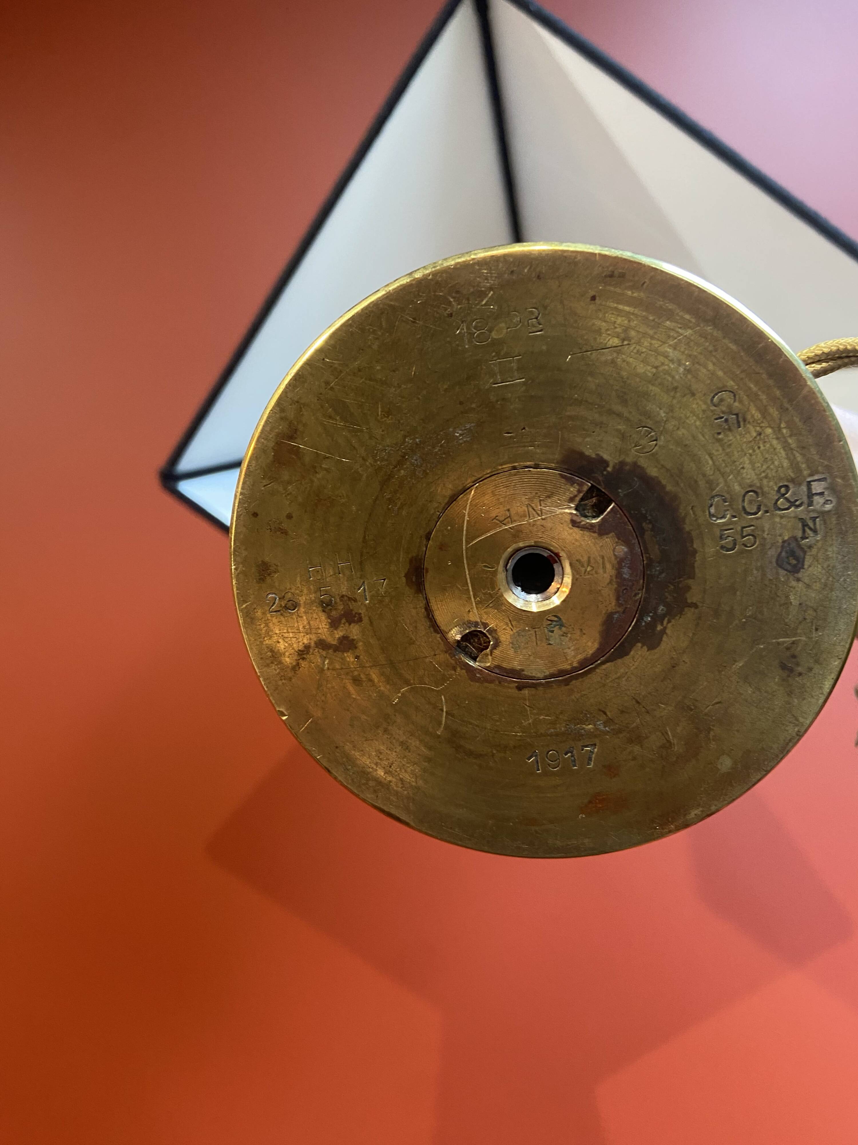 Brass shell socket lamp from the 1st WW, black pyramidal lampshade in Carlucci linen.