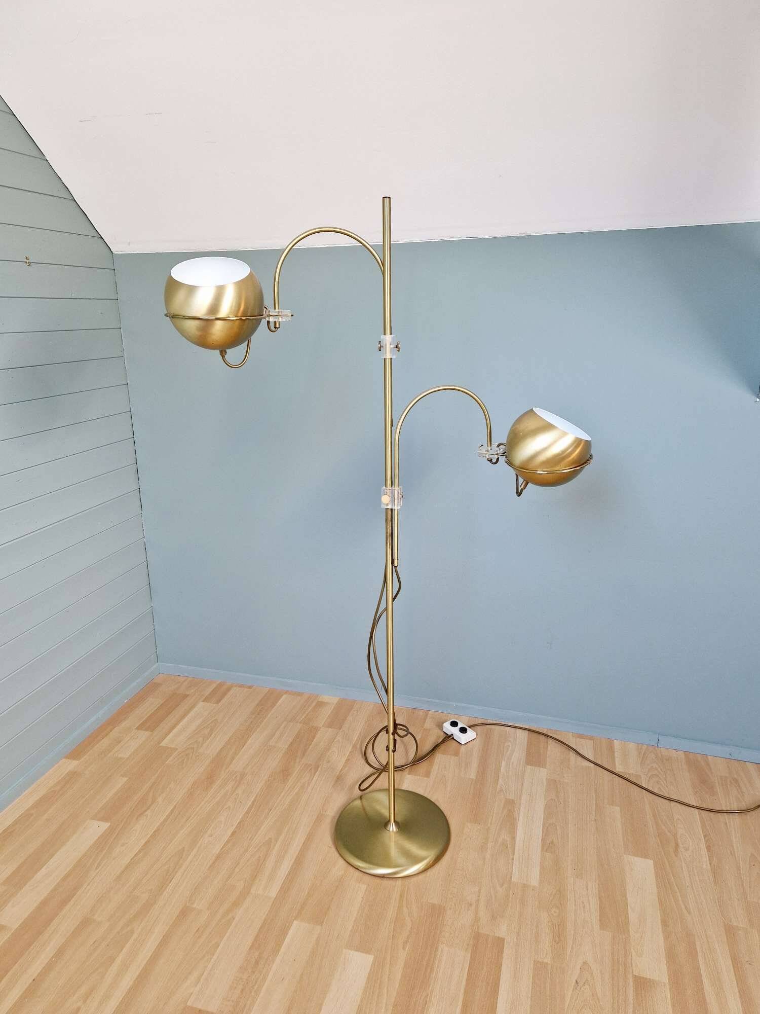 Brass eyeball floor lamp, by Gepo, 1960s-70s.