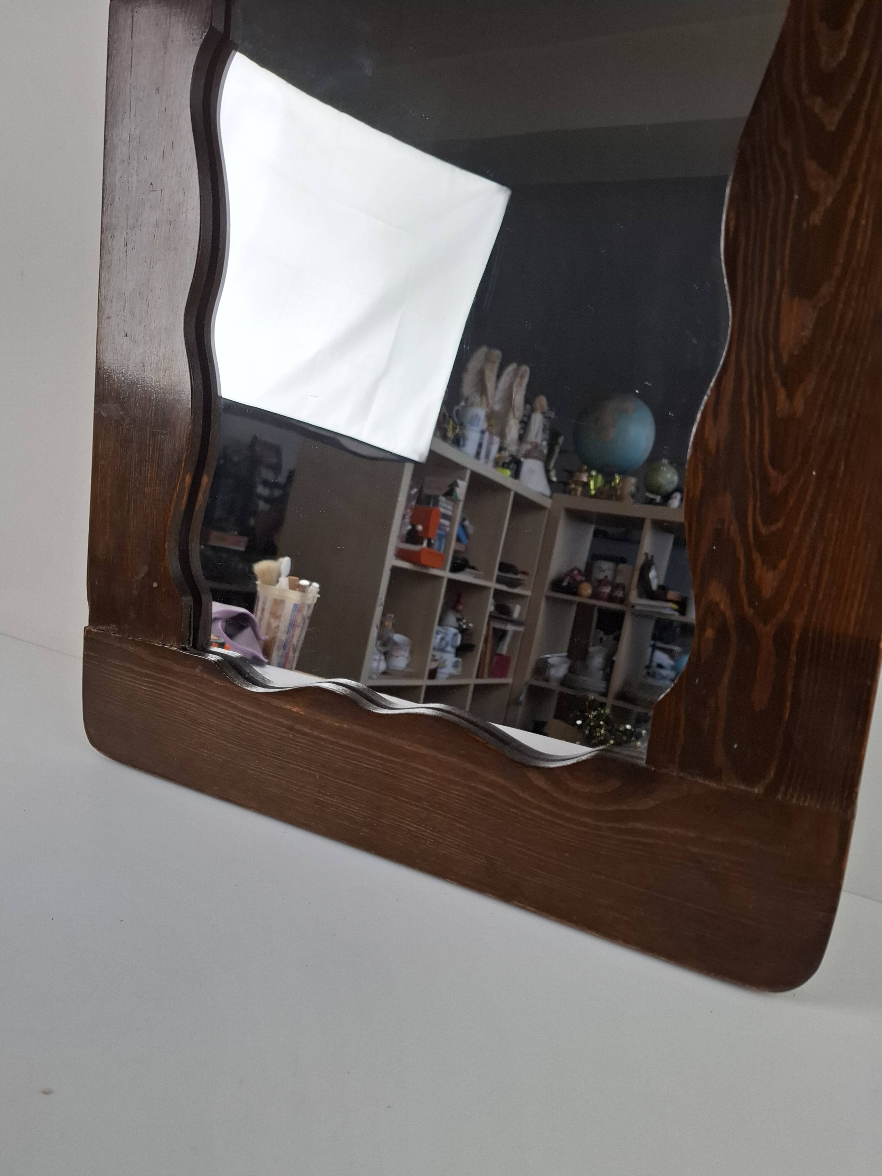 Czechoslovakian wall mirror with a wavy wooden frame, mid-century, 1940s