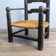 Véritable fauteuil bas style  Dudouyt en chêne, années 40