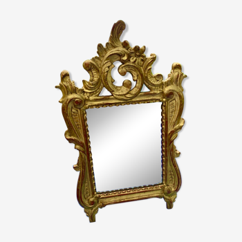 Miroir en bois sculpté et doré a la feuille glace au Mercure, Louis XV XVIIIème