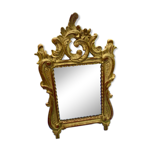 Miroir en bois sculpté