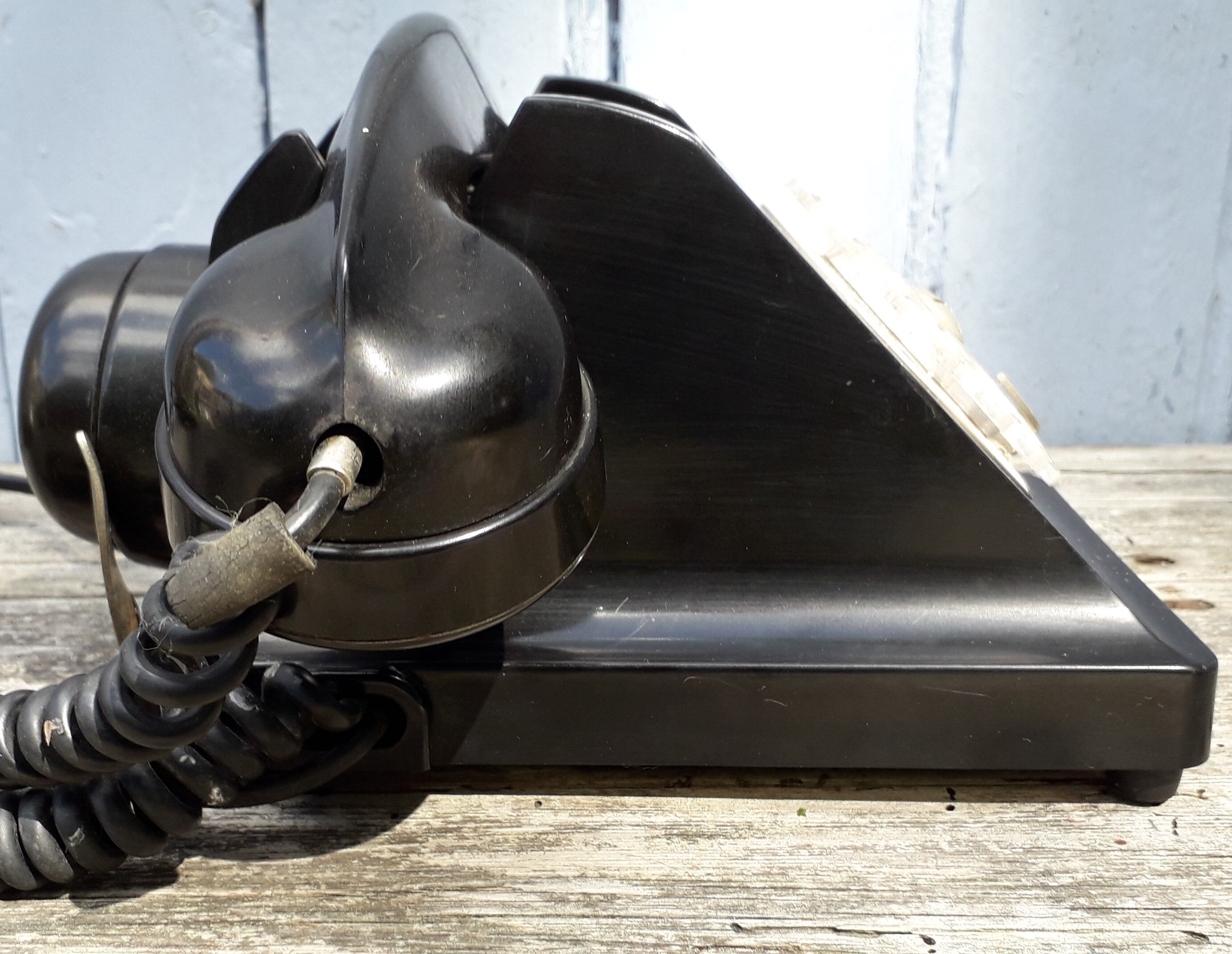 Phone has dial in bakelite